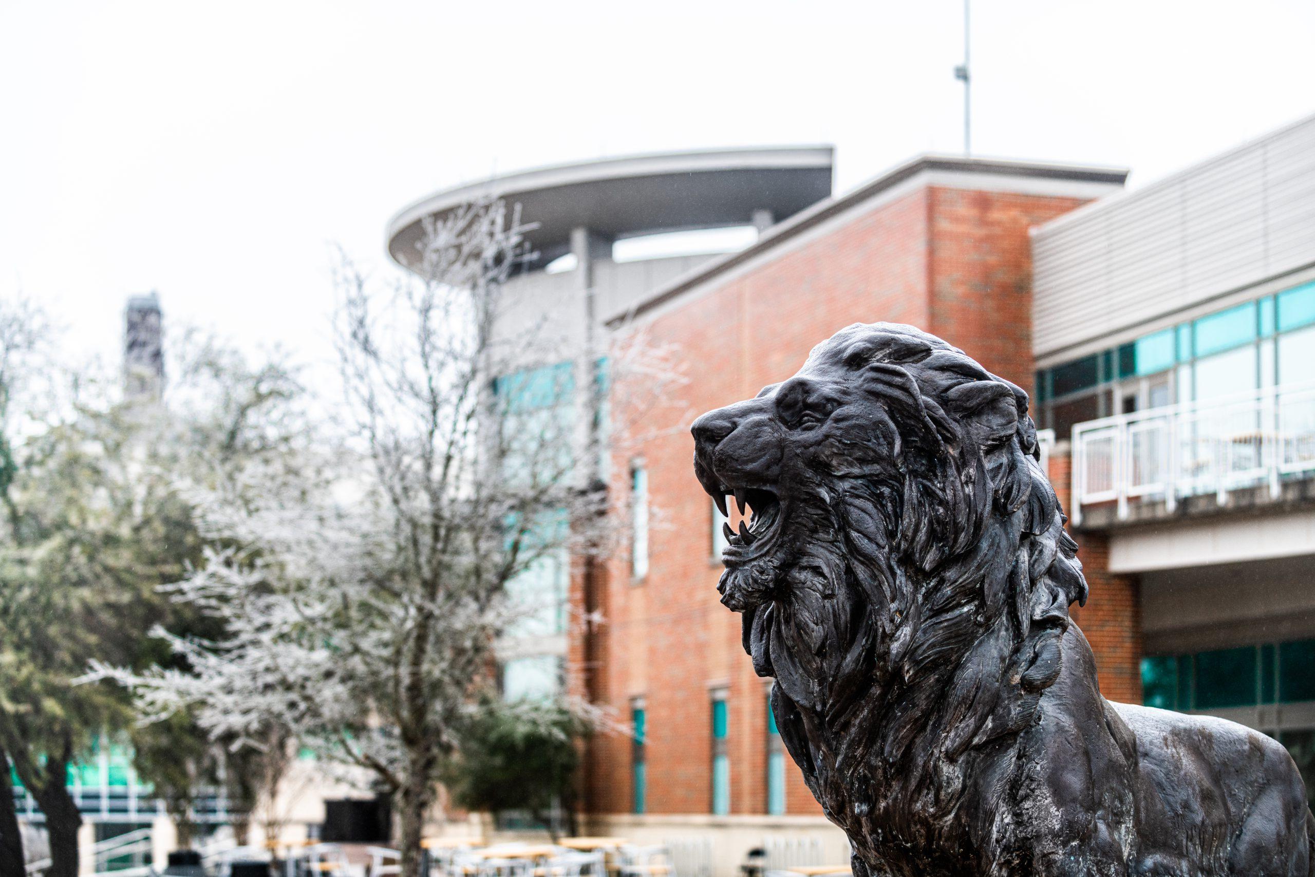 The front Rayburn Center with lion the statue.